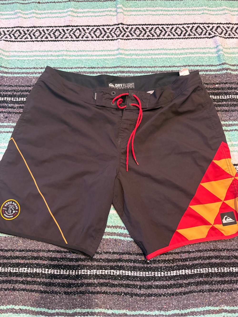 Quiksilver Men’s Black Swim Boardshorts with Red & Orange Geometric Panel